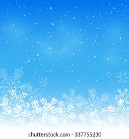 Christmas snowflakes on blue background