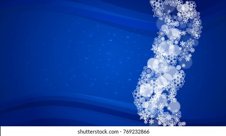 Christmas snowflakes on blue background with sparkles. Horizontal frame for winter banner, gift coupon, voucher, ads, party events with Christmas snowflakes. Falling snow for holiday celebration