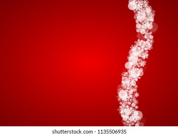 Christmas snowflakes on red background. Santa Claus colors. Horizontal frame for winter banner, gift coupon, voucher, ads, party events with Christmas snowflakes. Falling snow for holiday celebration