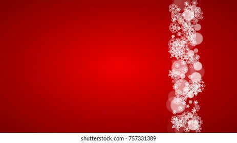 Christmas snowflakes on red background. Santa Claus colors. Horizontal Christmas snowflakes frame for holiday banners, cards, sales, special offers. Falling snow with bokeh for party celebration