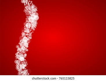 Christmas snowflakes on red background. Santa Claus colors. Horizontal frame for winter banner, gift coupon, voucher, ads, party events with Christmas snowflakes. Falling snow for holiday celebration