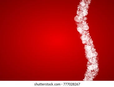 Christmas snowflakes on red background. Santa Claus colors. Horizontal frame for winter banner, gift coupon, voucher, ads, party events with Christmas snowflakes. Falling snow for holiday celebration