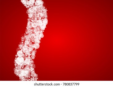 Christmas snowflakes on red background. Santa Claus colors. Horizontal frame for winter banner, gift coupon, voucher, ads, party events with Christmas snowflakes. Falling snow for holiday celebration