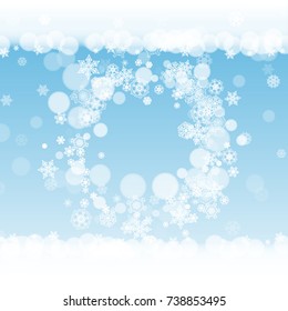 Christmas snowflakes on winter background. Frame for seasonal winter banners, gift coupons, vouchers, ads, party events. Blue sky with Christmas snowflakes. Falling snow for holiday celebration