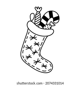 Christmas sock with candies in doodle style. Vector illustration.