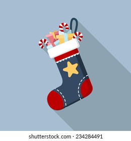 Christmas sock with candies, gifts and presents icon with long shadow. Vector illustration minimal flat design