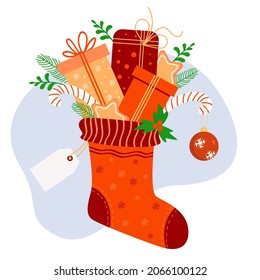 Christmas sock with gifts and tag. Gingerbread, New Years Christmas ball, caramel, fir branches with mistletoe. Vector illustration. For greeting cards, prints, decor, cards, banners and designs