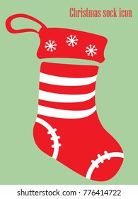 Christmas sock icon in red and white colors isolated on green background. Vector illustration
