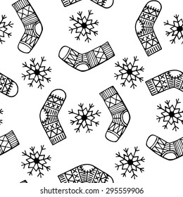 Christmas sock and snowflake black and white sketch vector seamless pattern