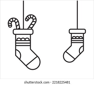 Christmas socks with candles inside. Symbol or logo for projects