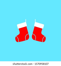 Christmas socks flat icon on blue background