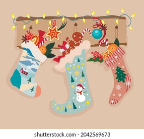 Christmas socks with gifts and gingerbread. Tangerines, Christmas tree branches, socks with Christmas patterns. Icon for website, greeting applications, holidays. Clipart for Christmas card. Vector fl