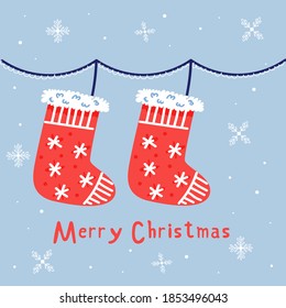 Christmas socks for gifts on a rope. Christmas holiday cute elements. New year greeting card