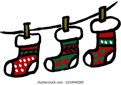 Christmas socks hanging on a rope. Vector outline doodle isolated on transparent background