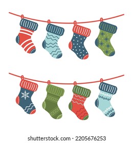 Calcetines de Navidad en una cuerda. Ilustración vectorial.