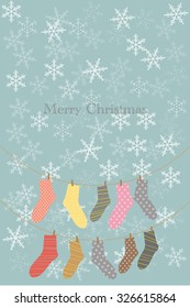 Christmas socks on snowflakes background.