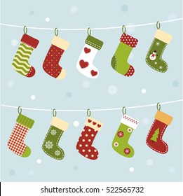 Christmas socks set on winter background. Cute stockings. New Year greeting card or background. Vector illustration in cartoon style