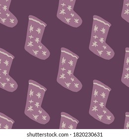 Christmas socks with star ornament stylized seamless winter pattern. Purple palette new year artwork. Cozy backdrop. Great for wallpaper, textile, wrapping paper, fabric print. Vector illustration.