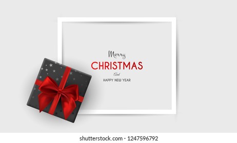 Christmas, square banner in form of gift with red ribbon and bow, on winter background. Greeting card or banner template. Vector illustration.