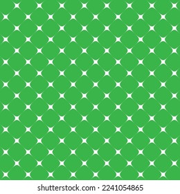 Christmas star dot pattern. White star pattern on green background. Christmas theme color fabric and textile design.