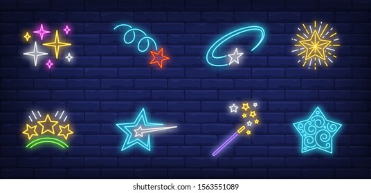 Christmas stars neon sign set. Magic wand, motion, miracle. Vector illustration in neon style, bright banner for topics like New Year, party, celebration, fun