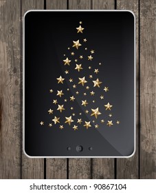 Christmas stars tree at Touch Screen for Christmas design, wood background