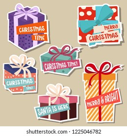 Christmas stickers collection with gift boxes. Isolated items