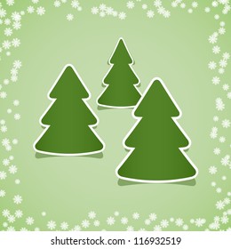 Christmas stickers with snowflakes on a green background.
