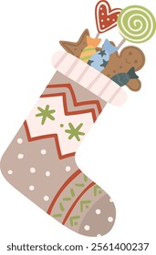 Christmas stocking full of sweets and candies celebrating Christmas Eve with gingerbread man, candy canes, lollipop and star shaped cookies