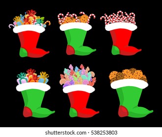 Christmas stocking with gifts set. Candy cane and cookie. lollipops Cock. Sweets and toys for children. traditional Holiday Xmas sock for gift. New year collection