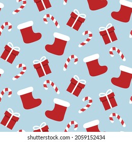 Christmas stocking seamless pattern with gifts and sweets