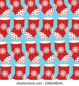 Christmas stocking set isolated on blue background. Holiday Santa Claus winter socks for gifts