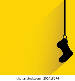 christmas stocking, sock on yellow background, shadow and flat theme