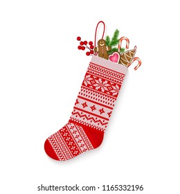 Christmas stocking with sweets and gifts in Scandinavian style isolated on white background Hand-knitting Red and white festive Christmas ornament Vector illustration