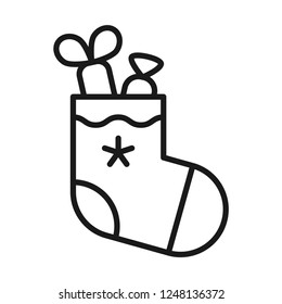 Christmas stocking with sweets icon. Line style