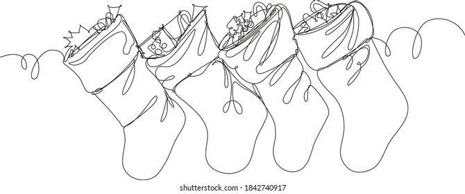 Christmas stockings hanging on the fireplace single line drawing