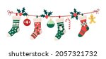 Christmas stockings with traditional holiday ornaments, decoration balls, gingerbread man. Hanging children clothing elements with xmas patterns on rope. Socks with snowflakes, snowman, christmas tree