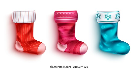 Christmas stockings vector set design. 3d christmas stocking socks with colorful stripes and snowflakes pattern elements for xmas decoration collection. Vector illustration.
