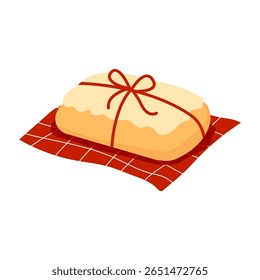 Christmas Stollen cake wrapped with a red ribbon, placed on a red checkered napkin. Vector illustration for winter holiday designs, bakery packaging, greeting cards, and festive decorations.