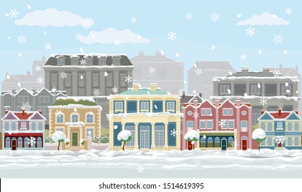 Escena navideña en la calle con casas victorianas y georgianas, tiendas y otros edificios en la nieve. Se puede inclinar sin problemas para que puedas hacer imágenes más largas.