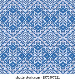 Christmas Sweater Design. Seamless Pattern. Needlework scheme. Knitted blue and white pattern.