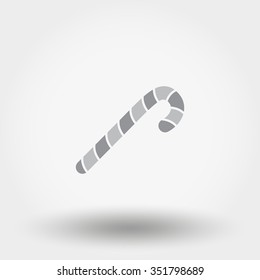 Christmas sweets. Lollipop. Grey icon for web and mobile application. Vector illustration on a white background. Flat design style.