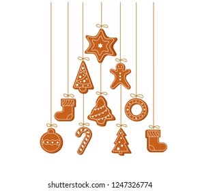 Christmas symbols gingerbread hanging. Garland with new year objects. Christmas tree, gingerbread man, star, Christmas stocking. New Year decorations