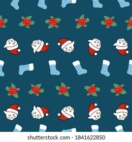 Christmas symbols and kittens seamless pattern
