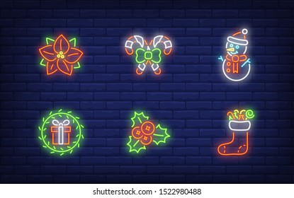 Christmas symbols neon sign set. Glowing neon snowman, hollen, candies. Holiday, celebration, present. Vector illustration in neon style for greeting card, invitation, announcement
