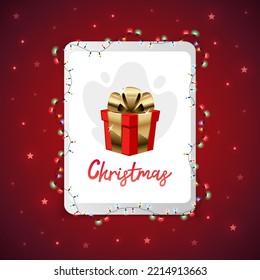 Tableta navideña con luces brillantes sobre fondo rojo. Feliz Año Nuevo concepto de compras en línea.