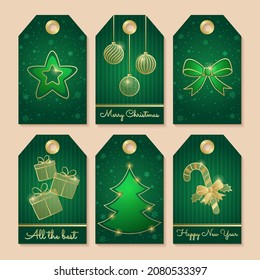 Christmas tags labels with star, bow, gift boxes, licorice stick on green background.