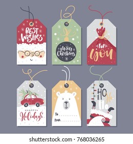 Christmas tags with lettering and hand drawn design elements.