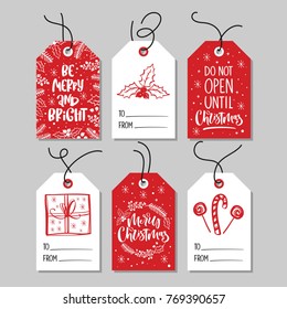 Christmas tags with lettering and hand drawn design elements.