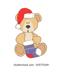 Christmas Teddy bear isolated on a white background with a christmas sock